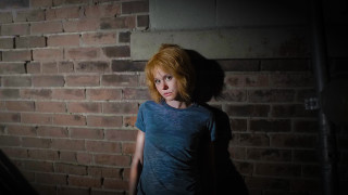 Woman brick wall light face - graffiti free wallpaper