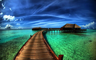 Tropical island pier hut clouds - tropical free wallpaper