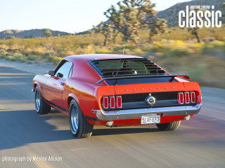 Red mustang driving desert road - a red mustang mustang free wallpaper