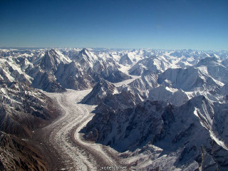 Mountain range airplane window glacier - amir zand free wallpaper