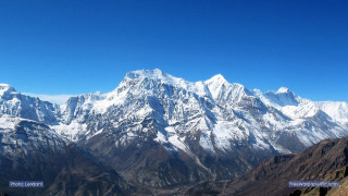 Mountain range snow capped blue 2 - a mountain range free wallpaper