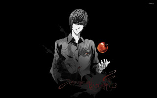 Man holding apple black background 2 - an apple free wallpaper
