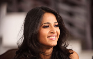Woman long hair smiling camera 5 - a smile free wallpaper