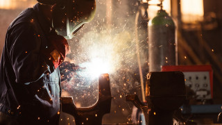 Welder working metal bright light - free light wallpaper