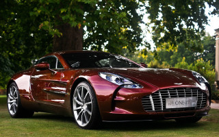 Red sports car grassy area - a grassy area next free wallpaper