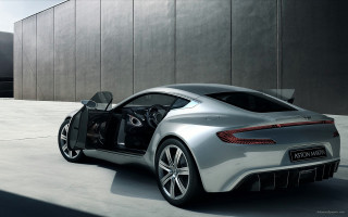 Silver sports car parked building - the car free wallpaper