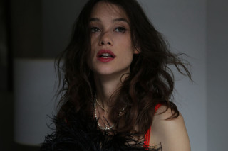 Woman feathered vest necklace serious - christen dalsgaard free wallpaper