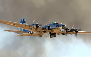 Blue white plane flying smoke - the back of the plane free wallpaper