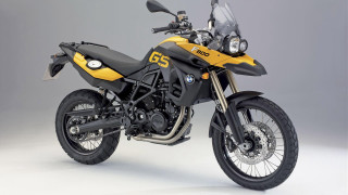 Yellow black motorcycle parked gray - motorcycle free wallpaper