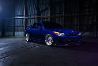 Blue car parked garage nighttime - a garage free wallpaper