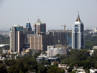 City tall buildings trees sky - free city wallpaper