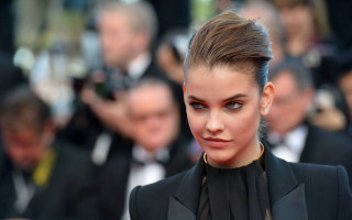 Woman high bun black suit - a black suit free wallpaper