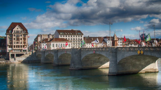 Bridge river buildings cloudy sky - both side of it free wallpaper