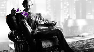 Man sitting chair book city - skyscraper free wallpaper