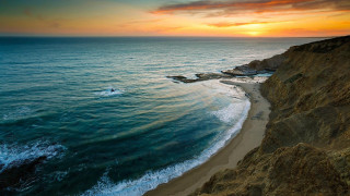 Sunset beach waves cliff water - wave free wallpaper
