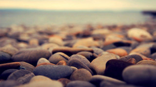 Beach rocks closeup macro bokeh - a beach near the ocean free wallpaper