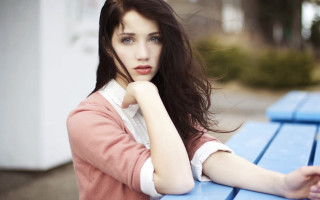 Woman sitting blue bench arms 2 - pale skin free wallpaper