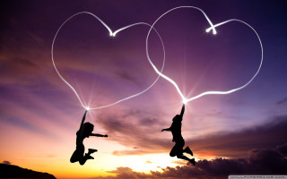 Flying people hearts sky above 2 - a sunset in the background free wallpaper