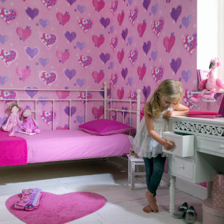 Little girl playing toy piano - the wall and floor free wallpaper