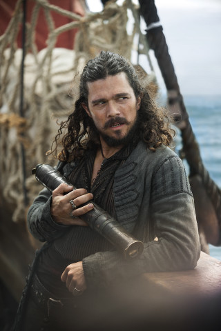 Man long hair beard gun - free beach wallpaper