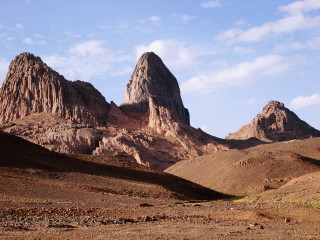 Mountain range rocks clouds sky - chafik charobim free wallpaper