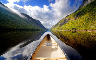 Boat river mountains clouds sky 2 - arthur quartley free wallpaper