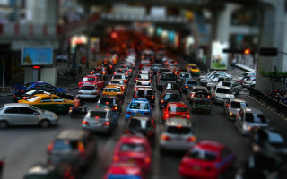 Busy city street traffic lights - tilt shift free wallpaper