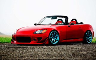Red sports car gravel road - eddie mendoza free wallpaper