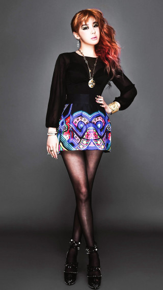 Woman black top colorful skirt - fauvism free wallpaper