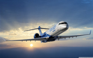 Jetliner cloudy sky sunset flying - free airplane wallpaper