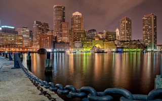 City skyline night chain link - front of it free wallpaper