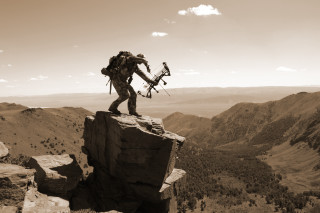 Man backpack bow rock mountains - ada hill walker free wallpaper for desktop