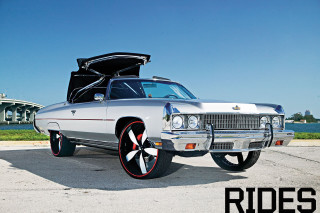 Car trunk with words rides - the back of its free wallpaper