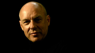 Bald man black shirt serious - a bald man free wallpaper