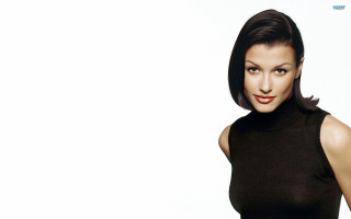 Woman black dress posing picture 23 - a white background behind her free wallpaper