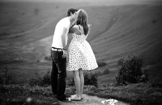 Man woman kissing hilltop countryside - a hill top free wallpaper