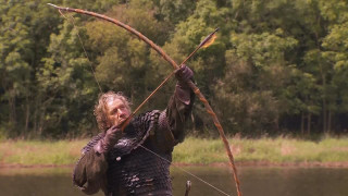 Man black outfit bow arrow 7 - a black outfit holding free wallpaper