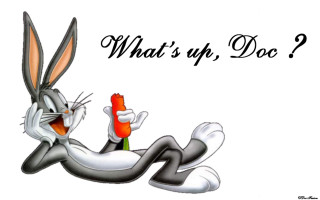Cartoon rabbit holding carrot whats - its mouth free wallpaper