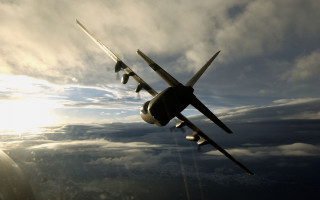 Large airplane flying cloudy sky 5 - a large air plane free wallpaper