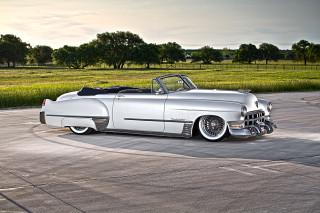 Silver car parked paved road - a silver car free wallpaper