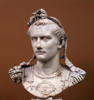 Bust man crown brown background - a marble sculpture free wallpaper