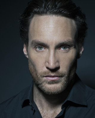 Man beard black shirt serious 2 - enzo cucchi free wallpaper