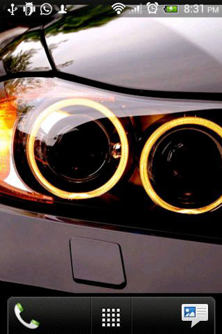 Car closeup headlight phone background - a light free wallpaper