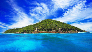 Small island ocean blue sky - a small island in the middle of the ocean free wallpaper