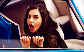 Surprised asian woman car window - a car window free wallpaper