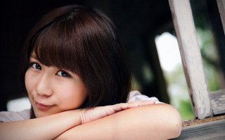 Woman arms crossed smiling looking - her face free wallpaper