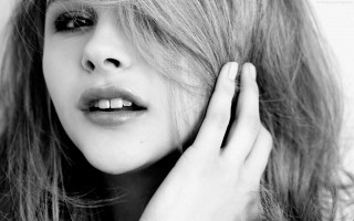 Woman long hair hand face - a smile free wallpaper for desktop