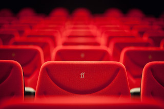Red seats theater auditorium row - a theater free wallpaper