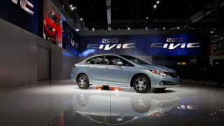 Silver car showroom large screen - a silver car free wallpaper
