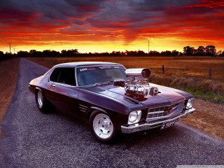 Car engine hood parked sunset - cloudy free wallpaper
